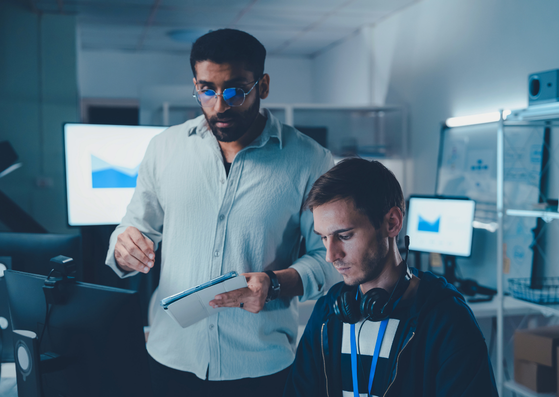 AI engineers collaborating on artificial intelligence and machine learning solutions