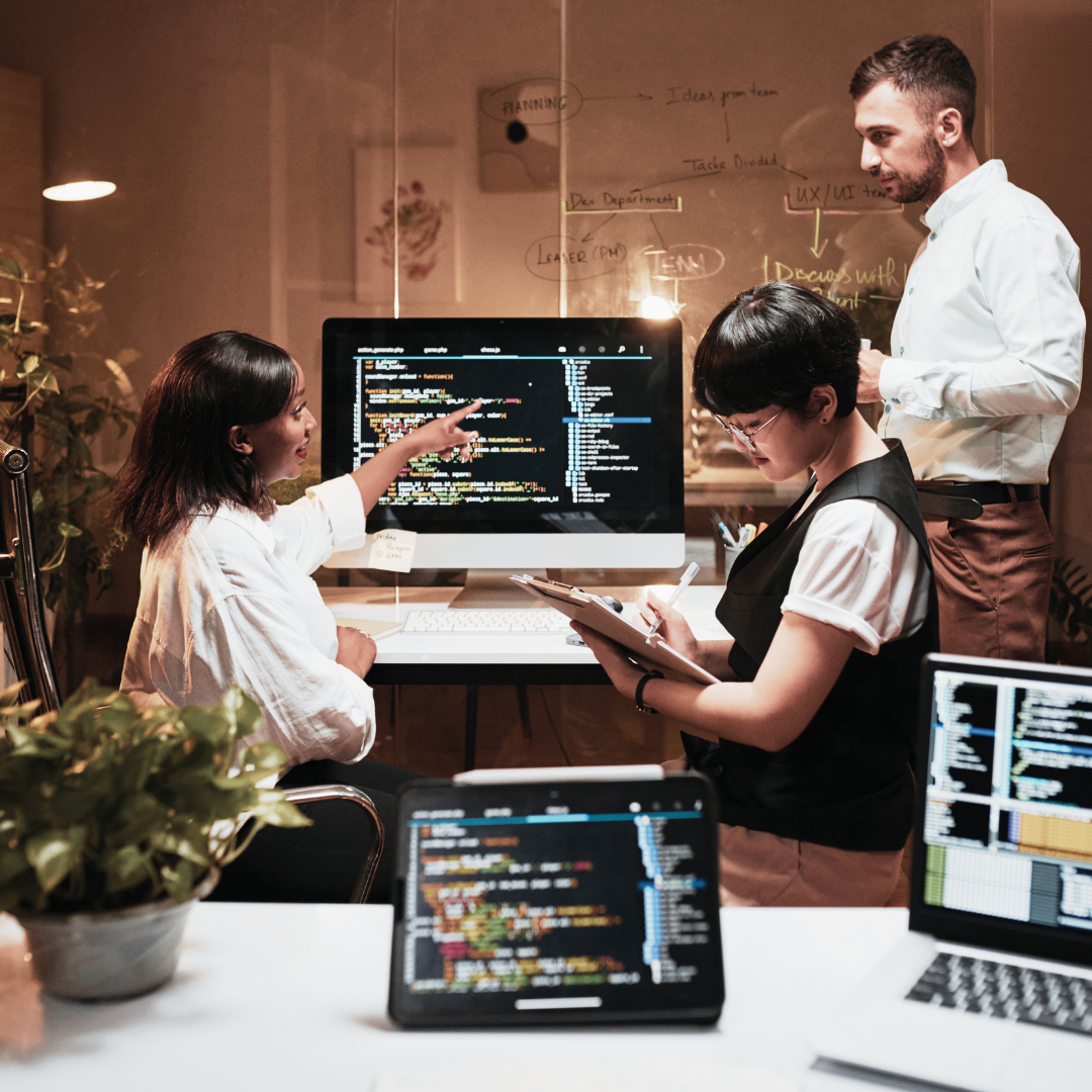 Software developers working in a corporate technology environment
